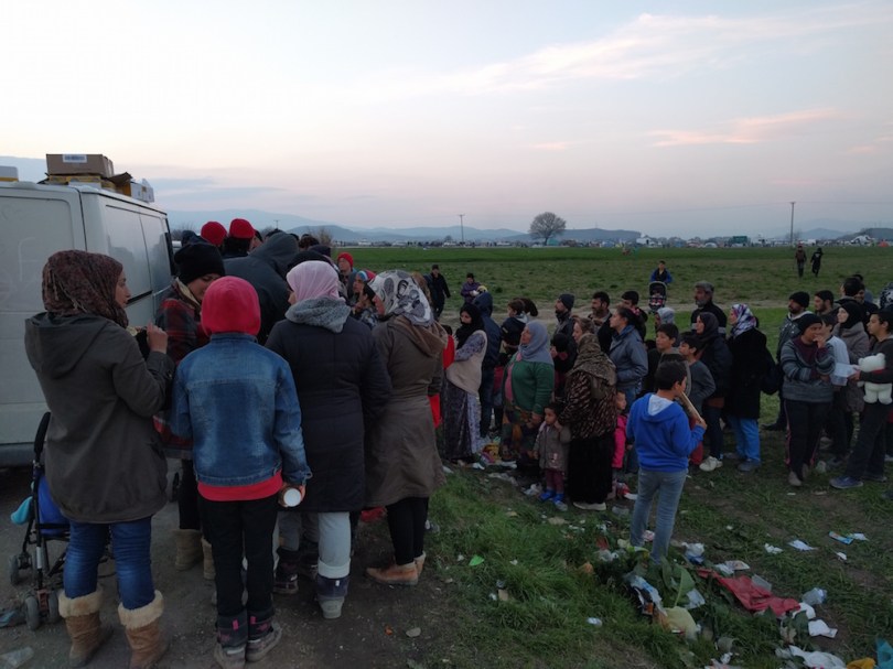 A line forms for ramen noodles from our distribution van at Idomeni camp