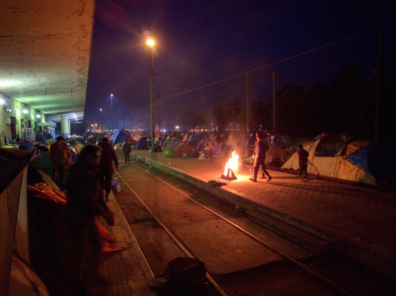 People sleeping on train tracks at Idomeni camp. A baby was born on the tracks within a couple of days of this photo
