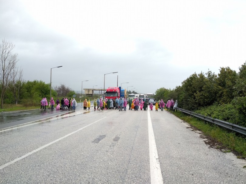 Refugees block the main road from Greece to Macedonia, causing a backlog for hours. In their eyes they are punishing Macedonia for closing its border